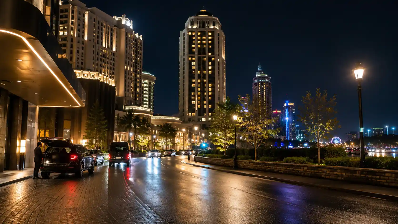 A vehicle pulled up to a lit hotel entrance on a Fallsview hotel-district street at night, an after-hours delivery arriving